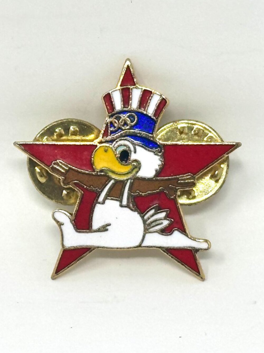 This is the perfect gift for the collector of Olympic pins and fans. It features